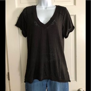 Free People black v-neck t-shirt.